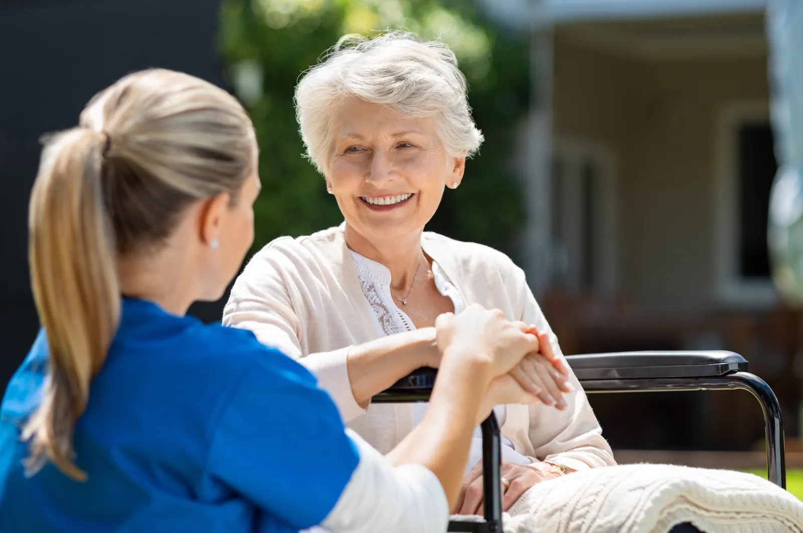 Nurse talking through medication with an older woman